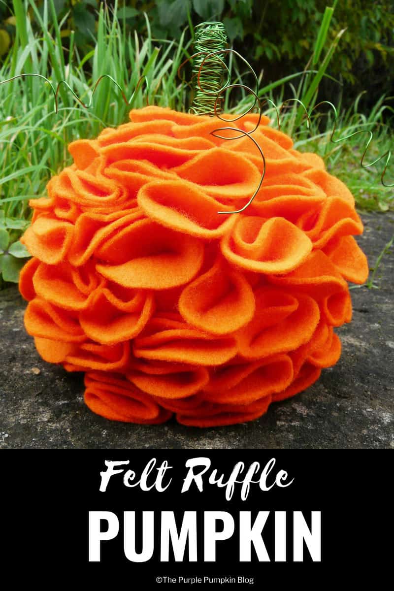 Felt Ruffle Pumpkin / A lovely autumn craft that is so simple to do. You will need orange felt, pins, some green wire, and a Styrofoam ball to make to make this felt pumpkin. It looks great on the mantel during the fall season!