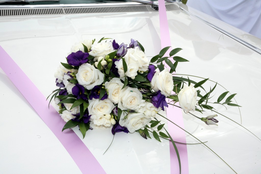 Wedding bouquet with freesias, lisianthus and white roses
