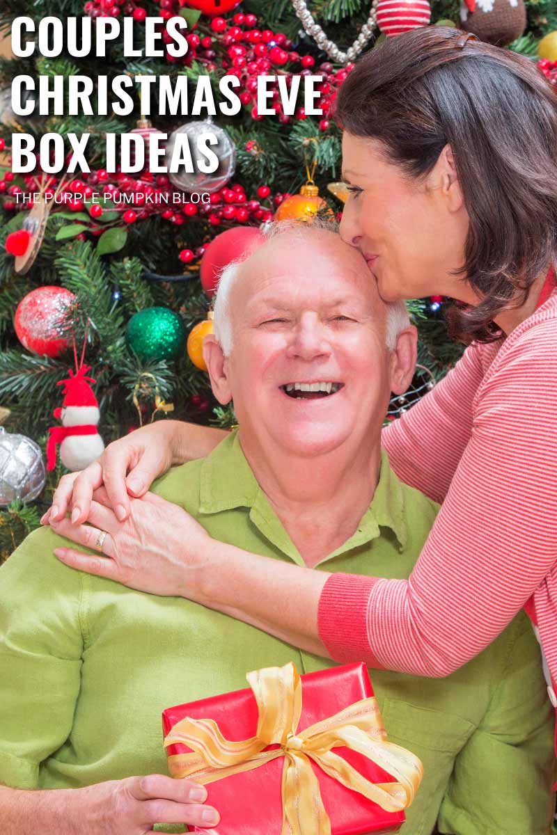 An older couple - woman in a pink shirt kissing the top of the head of a man in a green shirt holding a gift box. Text overlay: Couples Christmas Eve Box Ideas