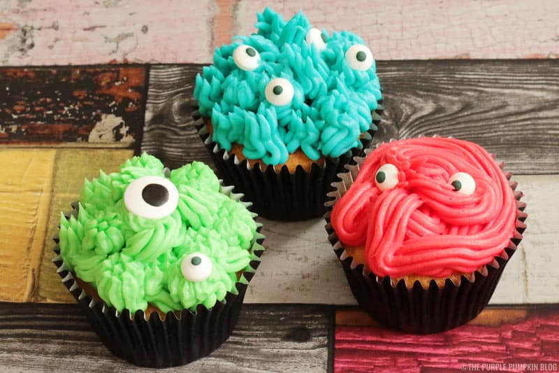Scary-Cute Monster Cupcakes! These monstrous cupcakes are so easy to make, and are a great sweet treat for a Halloween party food table, or for a monster themed birthday party!