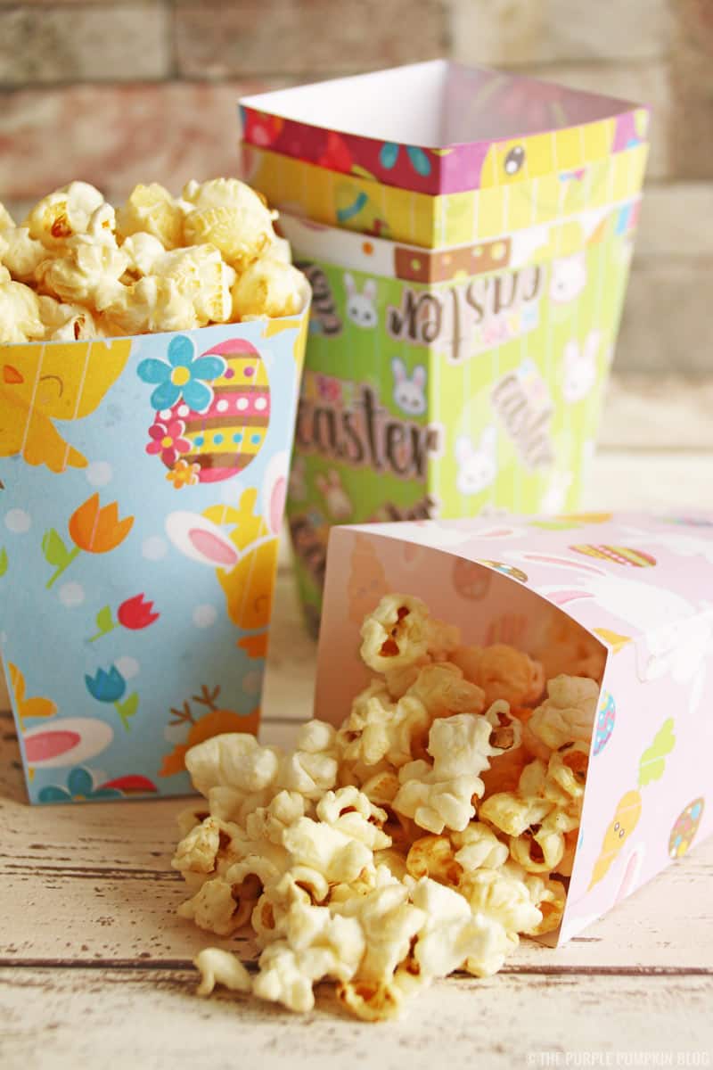 These free printable Easter popcorn boxes are so cute, and easy to make! Just download the free printables (6 different Easter designs), print, cut, fold, and stick together to form the popcorn box. The best part is filling each one with yummy popcorn! #EasterPopcornBoxes #FreePrintables #PopcornBoxes #EasterPopcorn #EasterPrintables