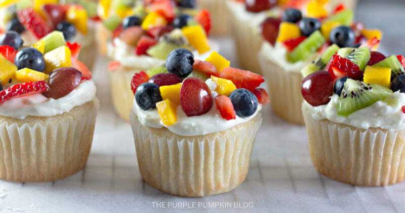 Cupcakes topped with fresh fruit salad