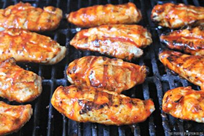 chicken cooking on the grill