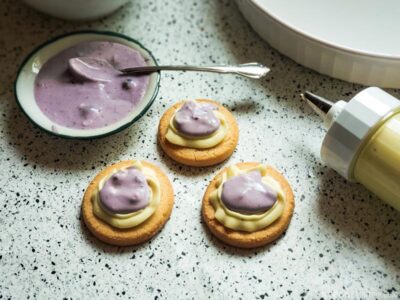 cookies topped with lemon and berry cheesecake mixture