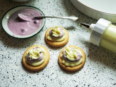 cookies topped with lemon and berry cheesecake mixture