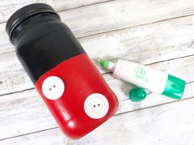 gluing buttons to jar