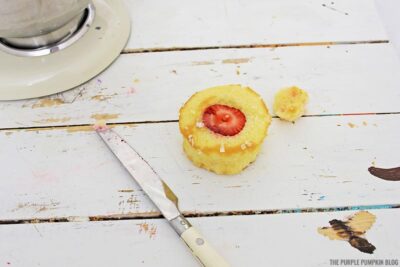 Filling cupcake with strawberry