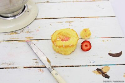 Filling cupcake with strawberry filling
