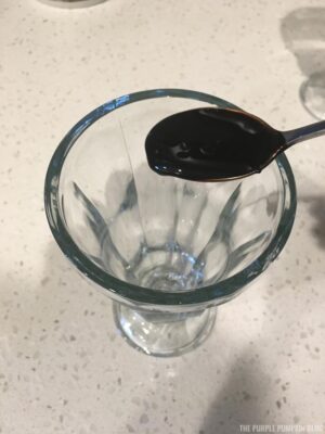 Chocolate Syrup into Glass
