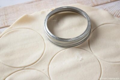Cutting mini pumpkin pie crusts