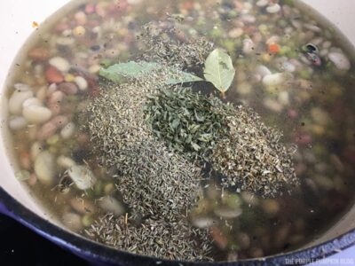 Adding Herbs to Soup Pot