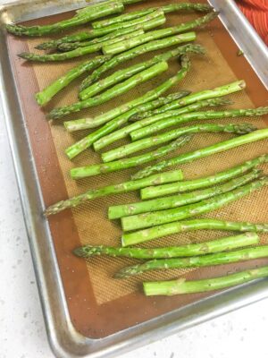 Asparagus on baking sheet