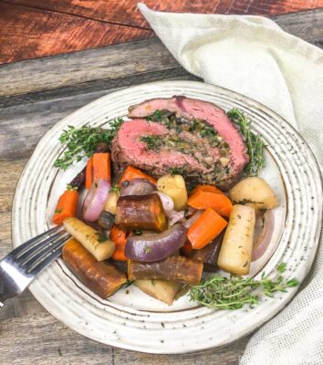 Slice of Stuffed Beef Tenderloin with Vegetables
