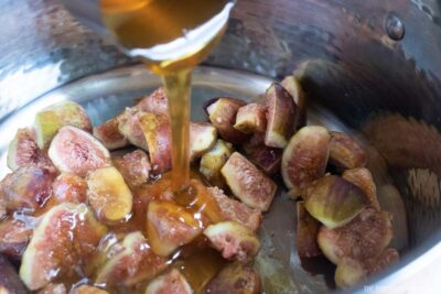 Adding honey to figs