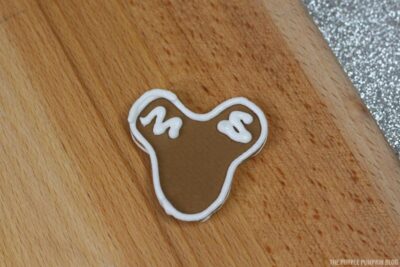 Piping on Gingerbread Mickey Head