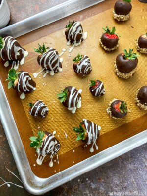 Strawberries dipped in chocolate and nuts