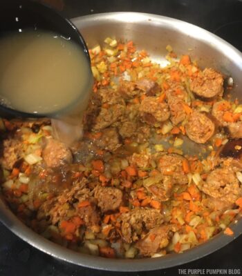 Adding Chorizo and Stock to Pan