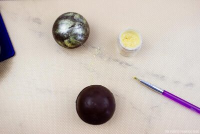 Adding Edible Gold Dust to Cocoa Bomb