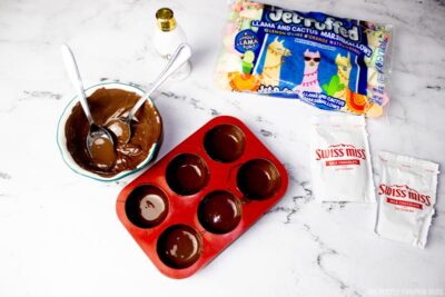 Adding Chocolate to Spherical Mold