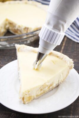 Adding Whipped Cream to Banana Cream Pie