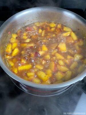Boiling the peach compote