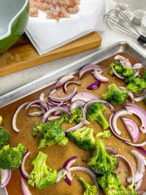 Broccoli and Onion on Baking Sheet