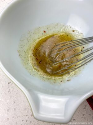 Whisking the dressing