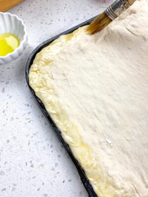 Brushing Oil on Pizza Dough