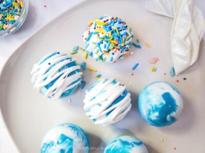 Drizzling Melted Candy over Cocoa Bombs