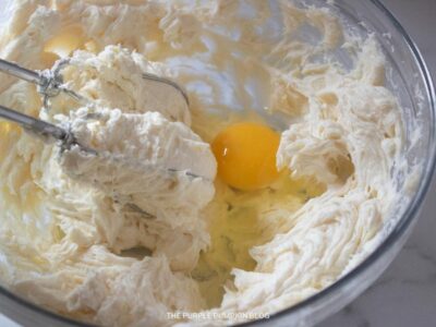 Adding Egg to Cheesecake Mixture