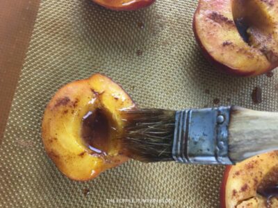Brushing Peach Halves with Balsamic & Maple Syrup