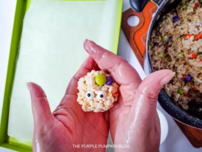 Add Candy Eyeballs to Rice Krispie Ball