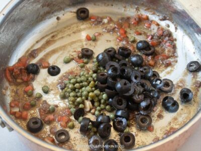 Adding Olives and Capers to Pan