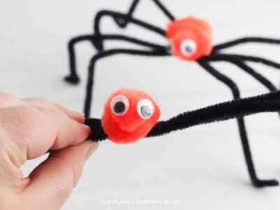 Adding the Googly Eyes to the Pompoms