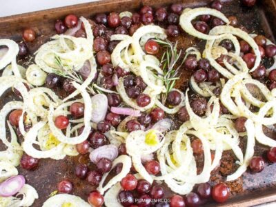 Fennel and grapes on sheet pan with rosemary