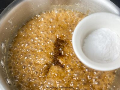Adding Baking Soda to Pan