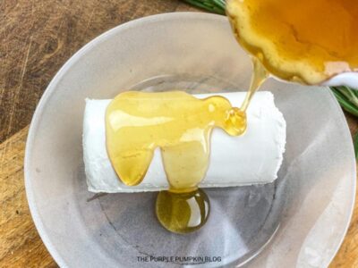 Adding Honey to Cheese Log