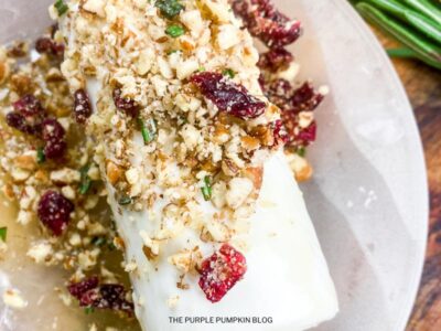 Adding Topping to Cheese Log