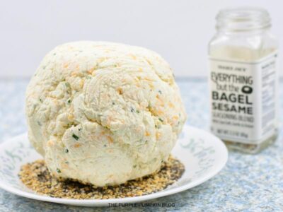Covering Cheese Ball in Bagel Seasoning
