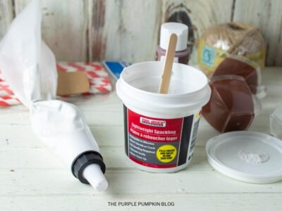 Placing Spackle in Piping Bag