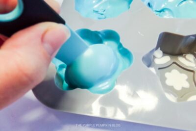 Adding Blue Candy Melts to Mold
