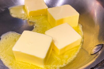 Adding Butter To Skillet