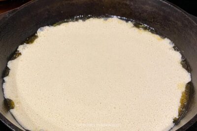 Pancake Batter Covering Skillet