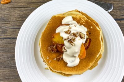 Stack of Buttermilk Pancakes with Peaches & Cream