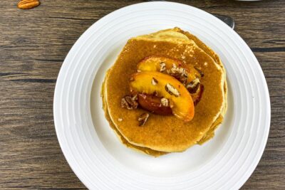Stack of Buttermilk Pancakes with Peaches & Pecans