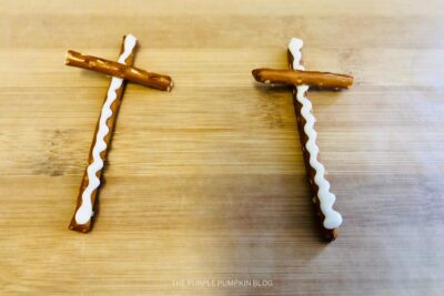 Add half-piece of Pretzel to form Cross