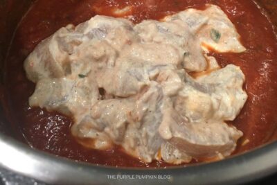 Adding Chicken to Pot