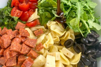 Adding Vinaigrette to Salad