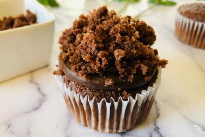 Crumbled Chocolate Cake on top of Frosting