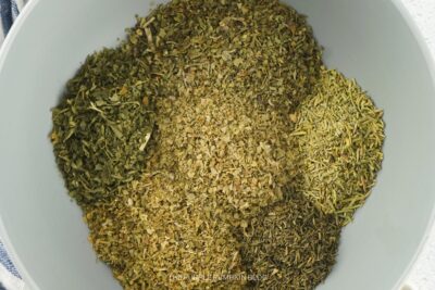 Mixing Italian Seasoning Herbs in Bowl